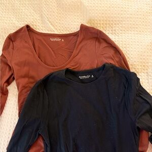 Two abercrombie body suits